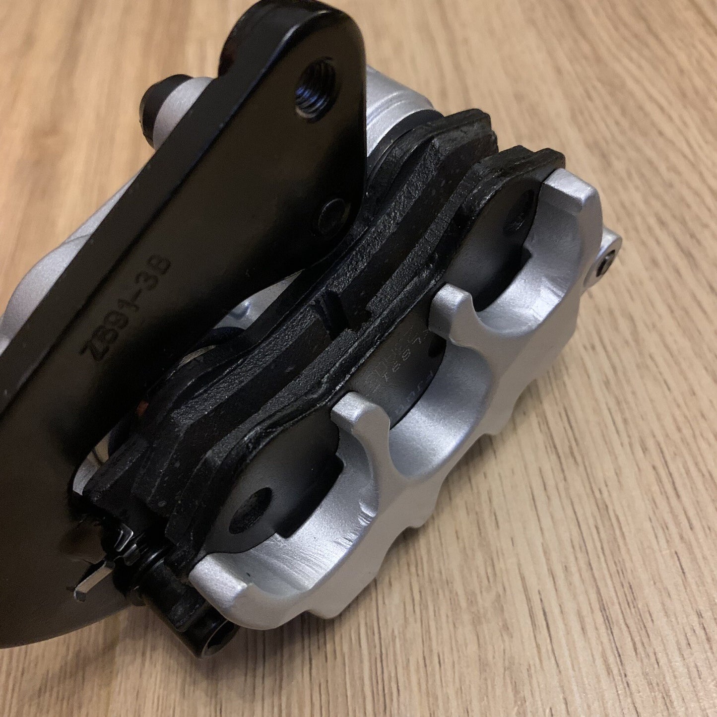 Lexmoto Adrenaline XFLM125GY-2B-E4 EFI 125 Front Brake Caliper With Brake Pads